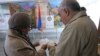 Armenia - Voters prepare to cast ballots at a polling station in Yerevan, 2Apr2017.