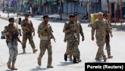Співробітники сил безпеки Афганістану після одного з опередніх нападів, серпень 2019 року