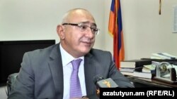 Armenia -- Tigran Mukuchian, chairman of the Central Election Commission, speaks to RFE/RL, September 23, 2018.