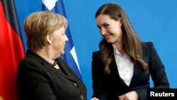 Немис канцлери Ангела Меркел менен Финляндиянын премьер-министри Санна Марин, Берлин, 19-февраль 2020-жыл. 