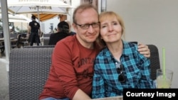 Mikhail Loshchinin with his mother, Olga Loshchinina