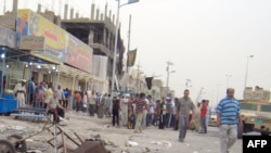 Evidence of an earlier bombing in Sadr City, the site of much of Baghdad's violence.