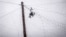 UKRAINE – An entangled Russian drone over a road covered with anti-drone net in the frontline town of Druzhkivka, amid Russia's attack on Ukraine, in Donetsk region, Ukraine April 24, 2026