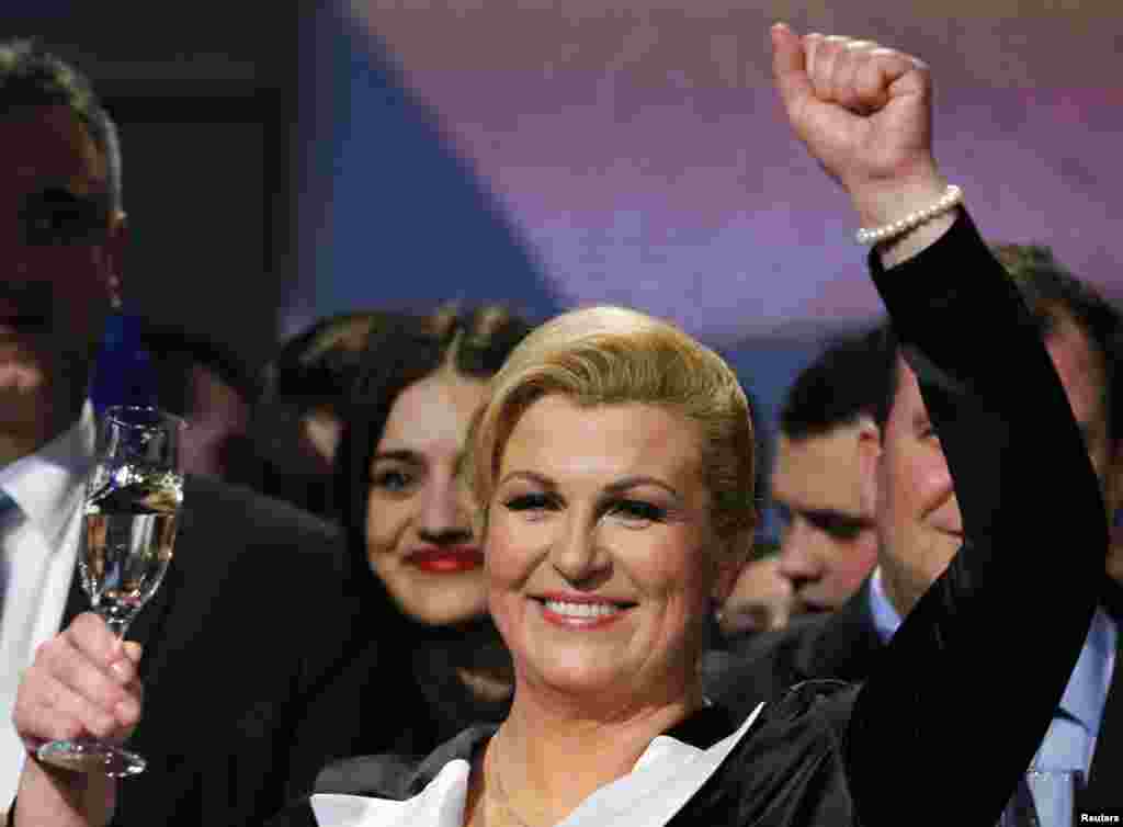 Croatia, Kolinda Grabar-Kitarovic of the opposition HDZ celebrates her victory in Croatia's presidential run-off election on the stage at her campaign headquarters in Zagreb January 11, 2015