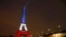 The Eiffel Tower is lit with the blue, white, and red colors of the French flag in Paris on November 16. 