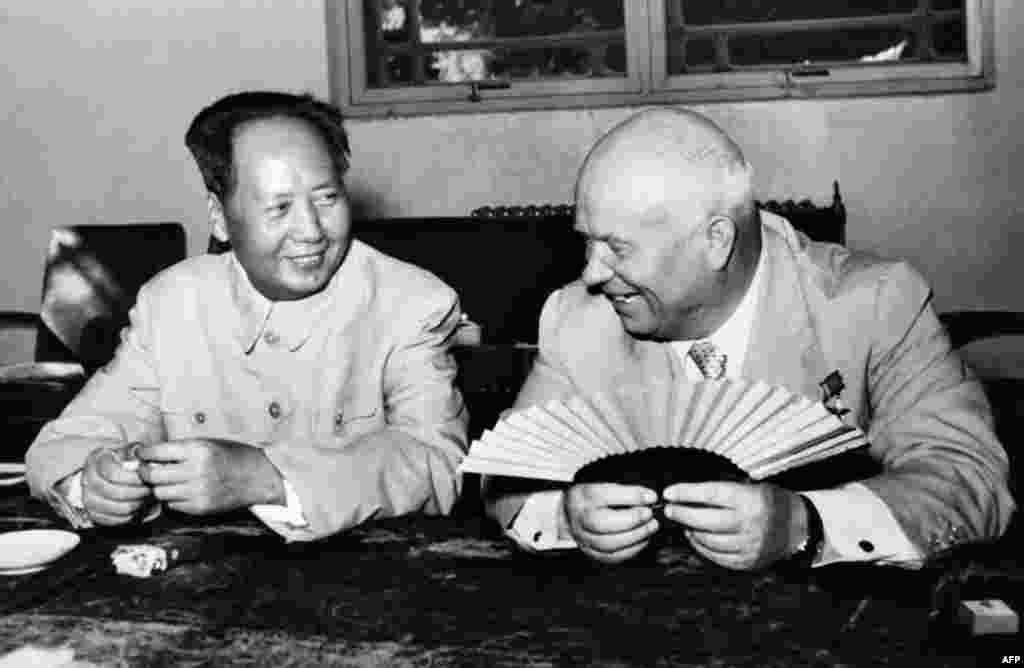 Khrushchev's moderate policies toward the West and his rejection of Stalinism led to a split with Communist China. In this picture, the visiting Soviet leader speaks with Mao Zedong in 1958.