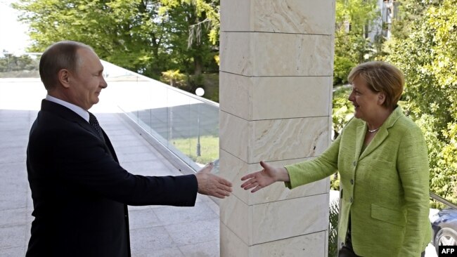 На встрече с Путиным, Меркель сформулировала кратчайшее решение проблемы Донбасса 