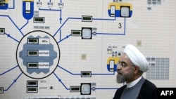 Iranian President Hassan Rohani visits the control room of the Bushehr nuclear power plant.