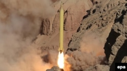 An Iranian long-range missile is launched at an undisclosed location in Iran on March 9, 2016.