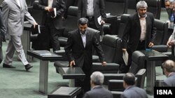 Iranian President Mahmud Ahmadinejad was summoned to explain his government's "procrastination in managing" the economy.