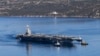 The US Navy aircraft carrier USS Gerald R. Ford departs Souda Bay on the island of Crete on February 26 as it heads toward Israel.