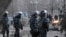 Gazak polisiýasy ýurduň Žanaozen şäherinde geçirilen protestler mahalynda, 18-nji dekabr.