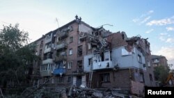 Житловий будинок, який постраждав від російського ракетного удару у Харкові, Україна, 31 травня 2024 року