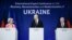 Прэзыдэнтка Эўракамісіі Урзуля фон дэр Ляен, прэм’ер-міністар Украіны Дзяніс Шмыгаль, канцлер Нямеччыны Оляф Шольц. Міжнародная экспэртная канфэрэнцыя ў пытаньнях аднаўленьня, рэканструкцыі і мадэрнізацыі Ўкраіны. Бэрлін, 25 кастрычніка 2022