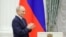 Владимир Путин во время церемонии вручения орденов "Мать-героиня" и "Родительская слава", иллюстративная фотография