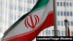 The Iranian flag flutters in front the International Atomic Energy Agency's headquarters in Vienna. (file photo)