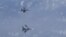 A video grab from the Russian Defense Ministry, which the ministry said shows a NATO F-18 jet (above) and a Russian Su-27 jet over the Baltic Sea.