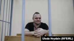 Dzmitry Halko came to the courtroom wearing a black short-sleeve shirt adorned with traditional Belarusian-Ukrainian embroidery patterns. 