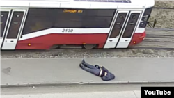 The man remained unmoving on the ground on June 6 until passersby noticed him.