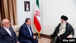 Iranian Supreme Leader Ayatollah Ali Khamenei, right, meets Hamas deputy chief, Saleh al-Arouri, second right, and the Hamas delegation, in Tehran, July 22, 2019. FILE PHOTO