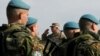 Armenia - General Yuri Khachaturov, chief of the Armenian army's General Staff, salutes troops from CSTO member states holding exercises at Marshal Bagramian shooting range, 30Sep2015.