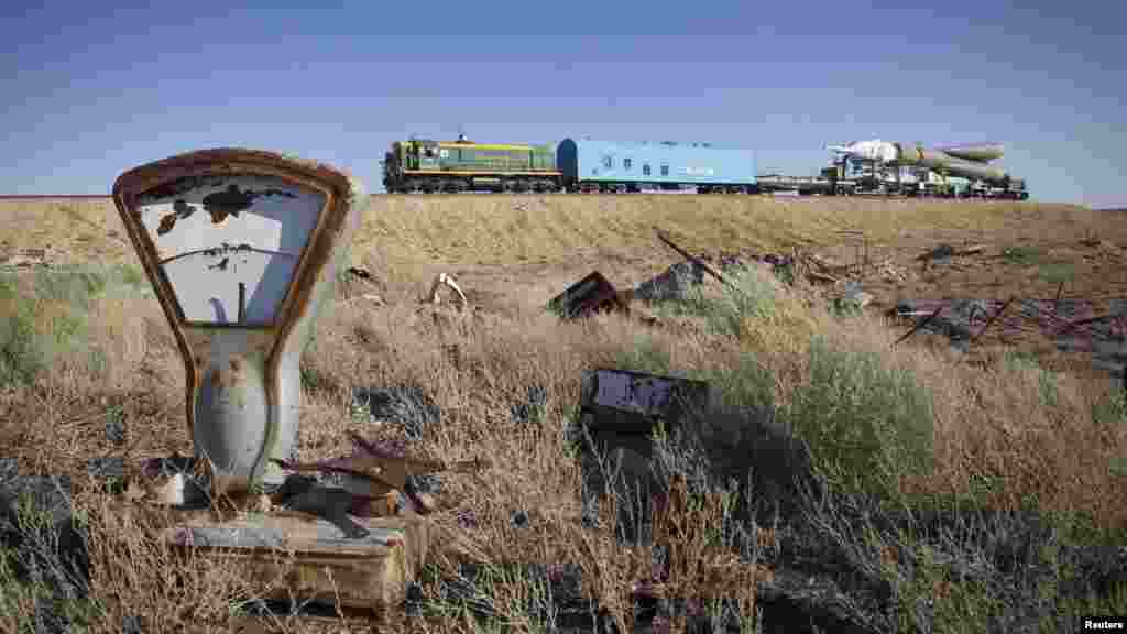 A Soyuz TMA-05M spacecraft crosses the bleak Kazakh steppes on its way to the Baikonur launch pad in July 2012.