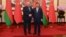 Belarusian strongman Alyaksandr Lukashenka (left) meets with Chinese President Xi Jinping in Beijing on December 4. 