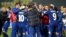 Bosnia-Herzegovina's squad and coaches celebrate qualifying for next year's soccer World Cup after beating Lithuania in October. It will be the first time the Balkan country will be competing at football's blue riband event. 