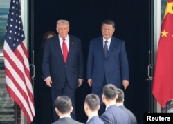 Donald Trump și Xi Jinping pe 30 octombrie 2025, la Summitul Economic Asia-Pacific, în Busan, Coreea de Sud.