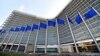 Флаги Евросоюза перед штаб-квартирой Еврокомиссии в Брюсселе 