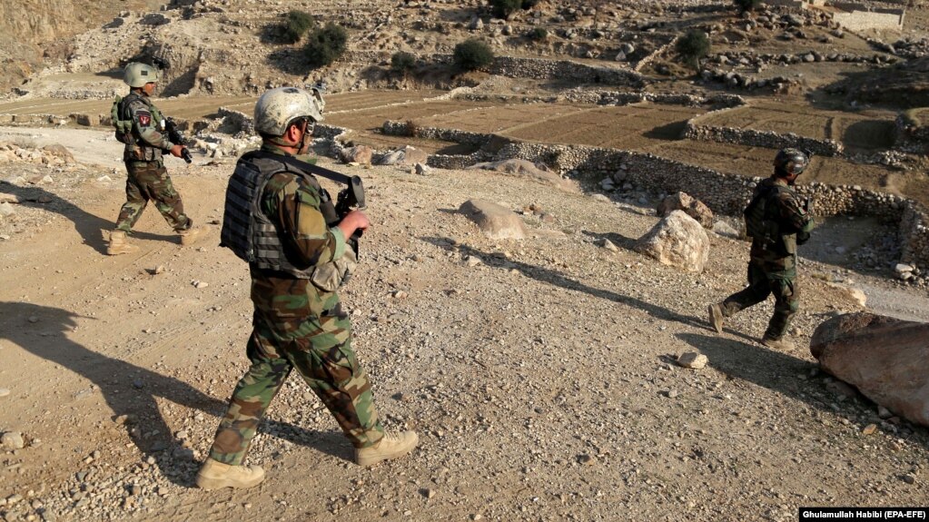 Afghan soldiers conduct a security check during operations in Achin earlier in 2018.