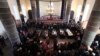 Armenia -- People surround coffins with the bodies of six murdered people during a funeral ceremony in Gyumri, January 15, 2015