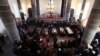 Armenia -- People surround coffins with the bodies of six murdered members of the Avetisian family during a funeral ceremony in Gyumri, January 15, 2015