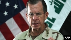 The chairman of the U.S. Joint Chiefs of Staff, Admiral Michael Mullen, speaks during a press conference in Baghdad on August 2.