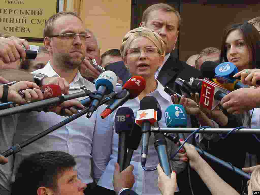 Tymoshenko talks to the press shortly before her arrest in Kyiv on August 5, 2011.