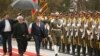 Iran - Iranian President Hassan Rouhani and Armenian Prime Minister Nikol Pashinian inspect an Iranian honor guard at a welcoming ceremony in Tehran, February 27, 2019.