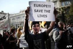 Участники демонстрации протеста против миграционной политики ЕС. Афины, 22 апреля 2015 года