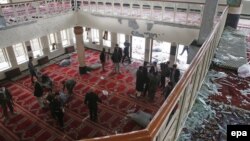 A view of the broken window panes at the scene of a suicide bomb attack on a Shi'ite Muslims religious school in Kabul on November 21.