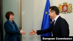 Georgian Prime Minister Bidzina Ivanishvili (right) meets with European Union foreign-policy chief Catherine Ashton in Tbilisi on November 26.