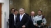 File photo:Israeli Prime Minister Benjamin Netanyahu (C) arrives at a weekly cabinet meeting in Jerusalem on June 2, 2019. 