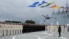 Russia - Russia's President Vladimir Putin (R) addresses the Admiral Gorshkov crew during Russian Navy Day celebrations in Baltiysk, July 26, 2015