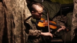 'Music Takes Your Mind Off War And Death': Ukrainian Violinist Plays In The Trenches