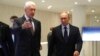 Moscow Mayor Sergei Sobyanin (left) tours an exhibition in Moscow with Russian President Vladimir Putin in July 2018.