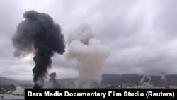 NAGORNO-KARABAKH -- Smoke billows above buildings in Stepanakert, October 4, 2020