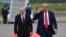US President Donald Trump salutes as he walks with Russian President Vladimir Putin on the tarmac after they arrived at Joint Base Elmendorf-Richardson in Anchorage, Alaska, on August 15, 2025.