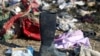 Passengers' belongings are pictured at the site where the Ukraine International Airlines plane crashed after take-off from Iran's Imam Khomeini airport, on the outskirts of Tehran, January 8, 2020