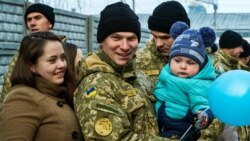 Військовослужбовець ЗСУ зі своєю родиною