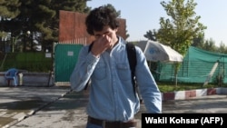 An Afghan refugee deported from Germany arrives at the international airport in Kabul on September 13.