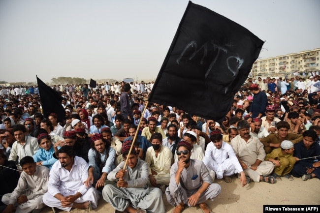 Supporters and activists of the Pashtun Protection Movement (PTM) at a rally in Karachi in May