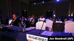 Seats for an Iranian delegation at a nuclear energy conference sit empty in Abu Dhabi, United Arab Emirates, Monday, Oct. 30, 2017.
